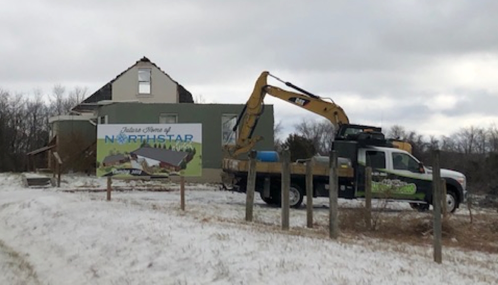 The Green House comes down